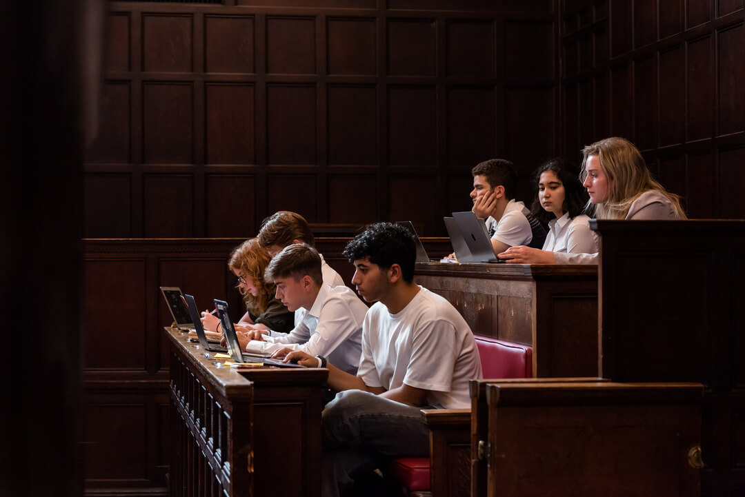 Oxford Scholastica Law students working in a law court