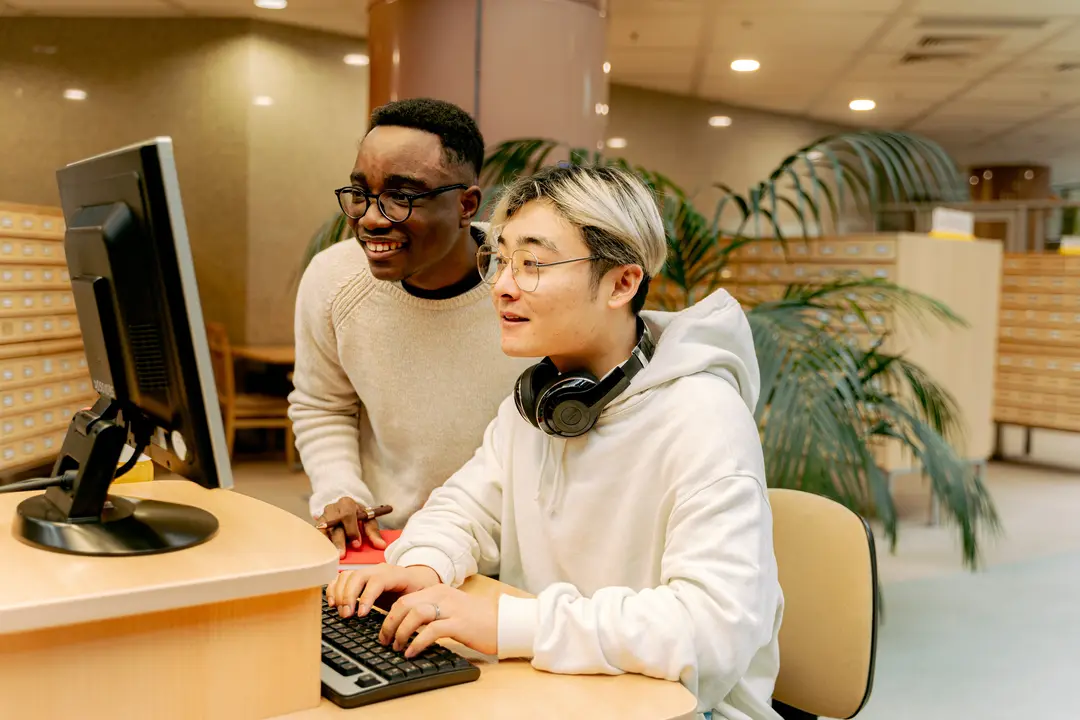 Two students using apps to study.