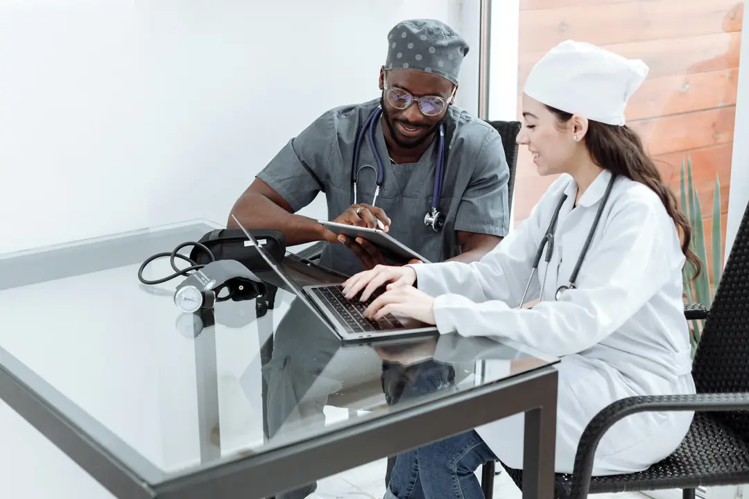 A medical student shadows another medical professional to gain experience.