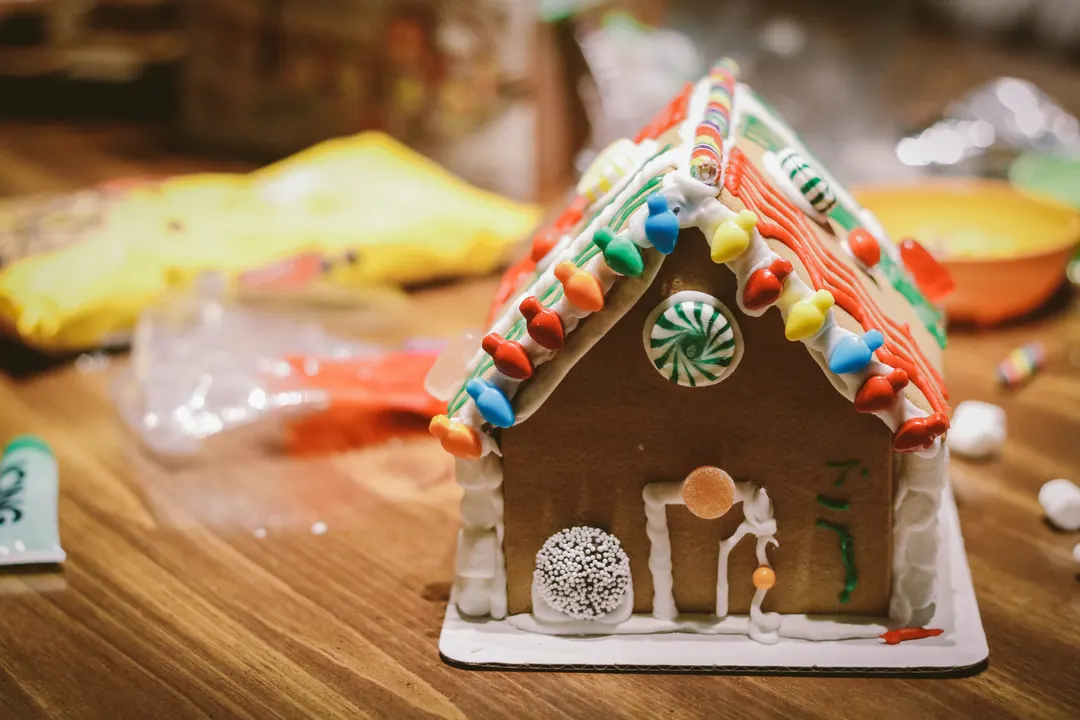 Decorated gingerbread house on a table