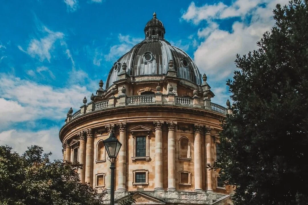 Radcliffe Camera, Oxford with trees in the foreground
