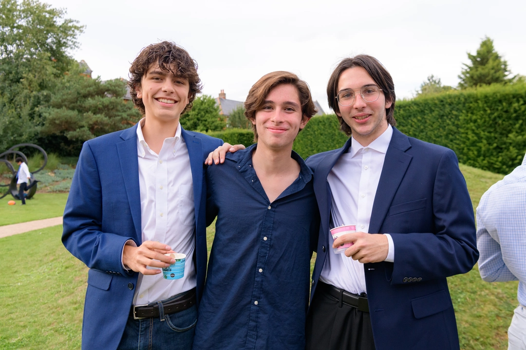 Three students at summer school graduation